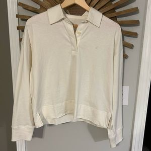 Everlane cream colored long sleeve polo